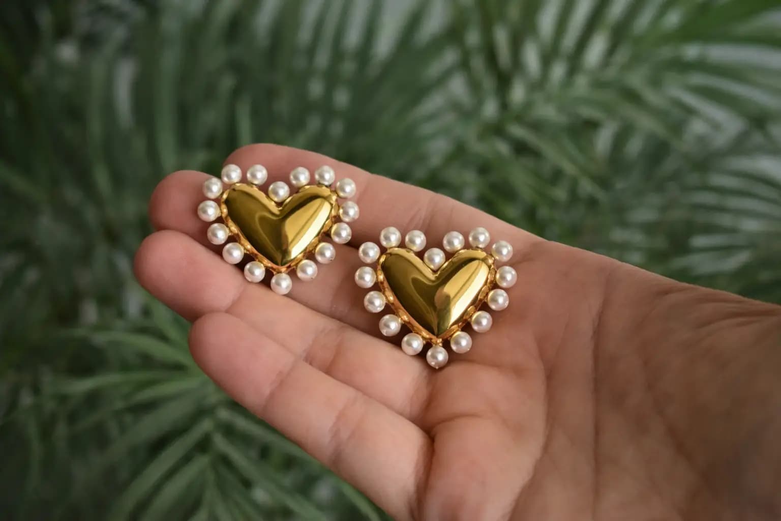 shop heart-shaped pearl earrings