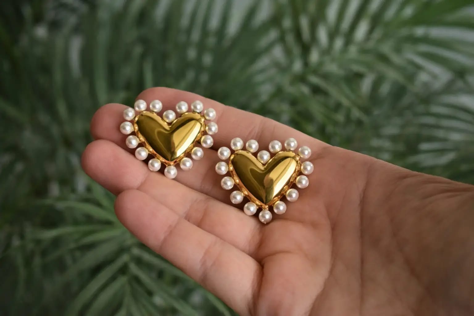 shop heart-shaped pearl earrings